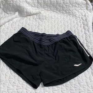 Saucony run/dry shorts with secret pocket on back.